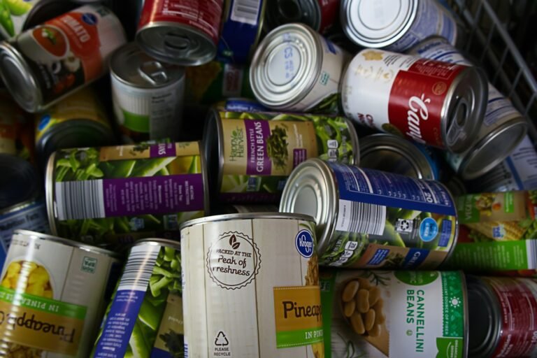 Food pantry shelves stocked with canned goods